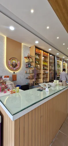 Premium wooden billing and checkout counter with a glass top